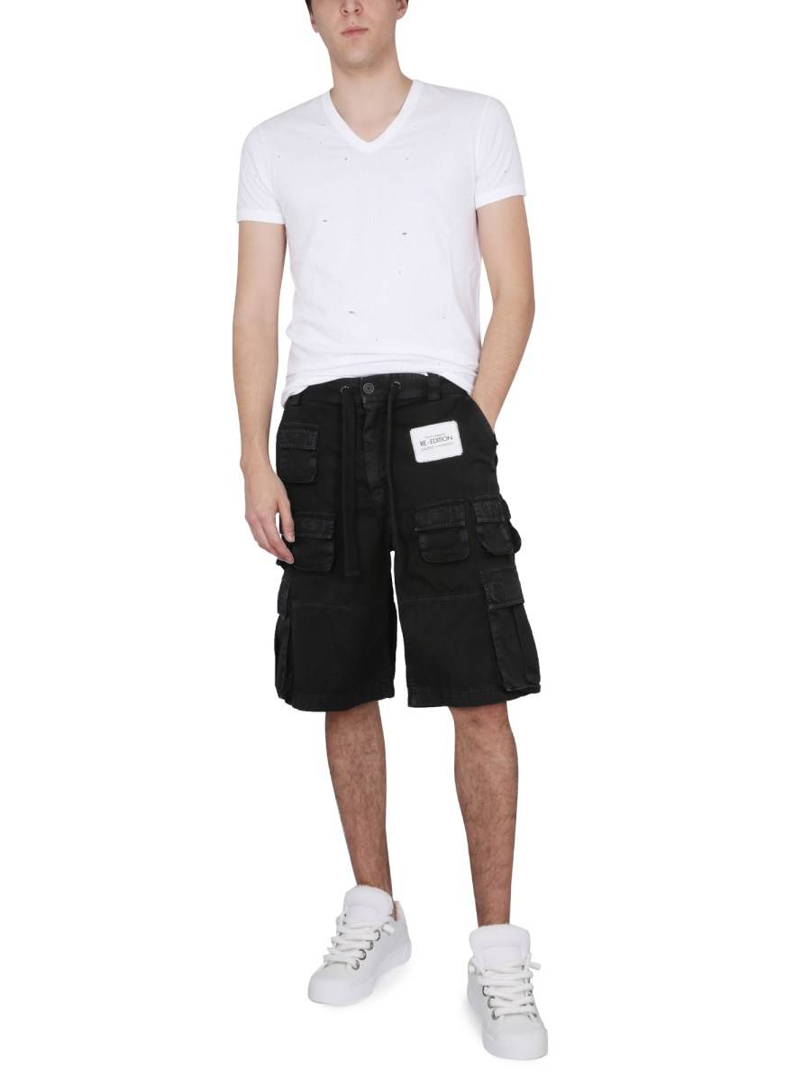 DOLCE & GABBANA T-SHIRT CON SCOLLO A V IN JERSEY DI COTONE LAVATO CON ROTTURE