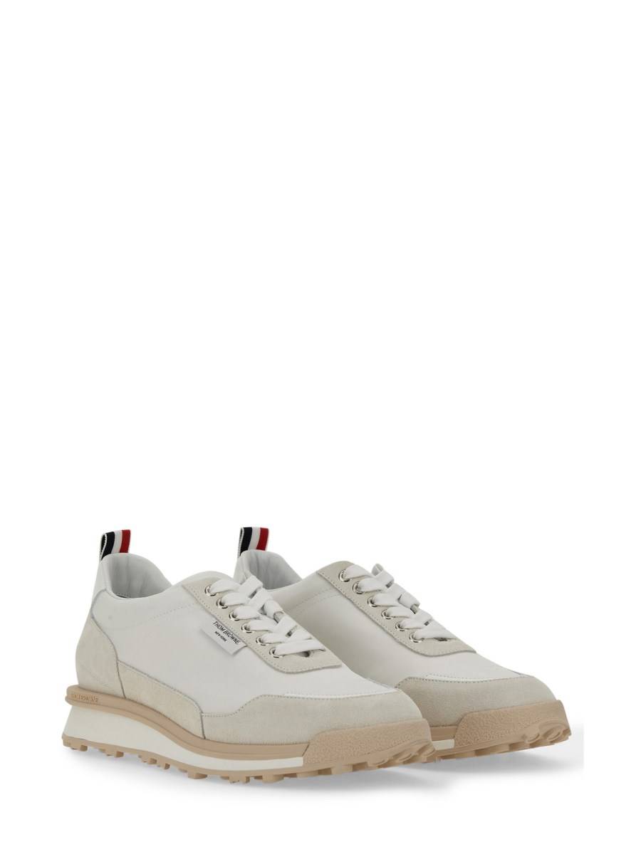 THOM BROWNE SNEAKER CON LOGO IN ECO NYLON E PELLE