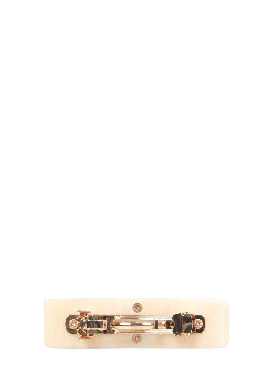TORY BURCH FERMA CAPELLI IN RESINA CON LOGO