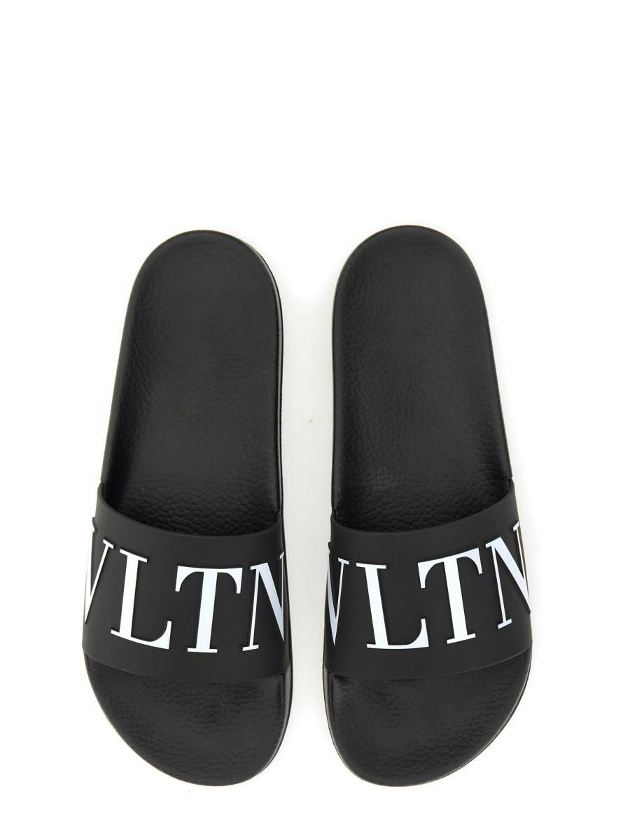 VALENTINO GARAVANI SANDALO SLIDE CON LOGO IN GOMMA