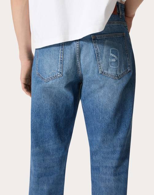 Red Valentino PANTALONE IN DENIM CON VLOGO SIGNATURE IMPRESSO