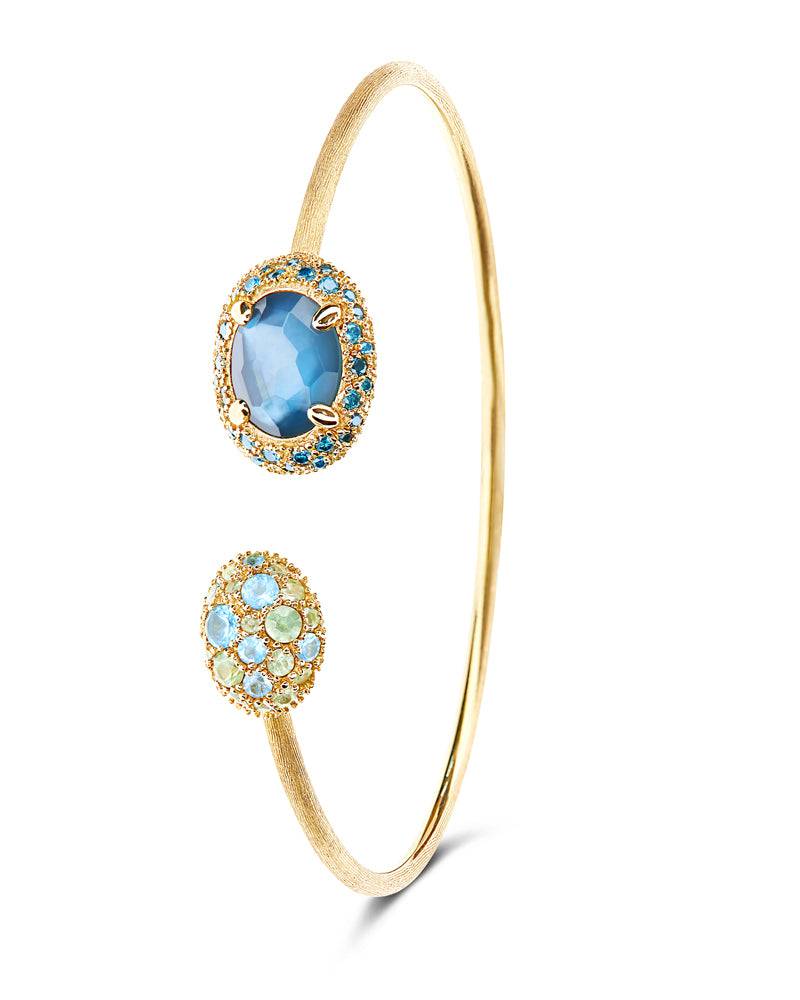 Nanis Bracciale a schiava "DANCING REVERSE" in oro, diamanti blu, topazio az – Nanis Italian Jewels