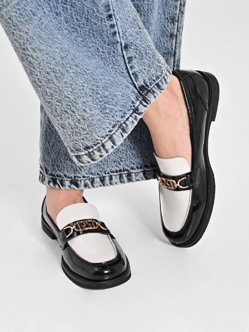 Rinascimento Mocassino Logo