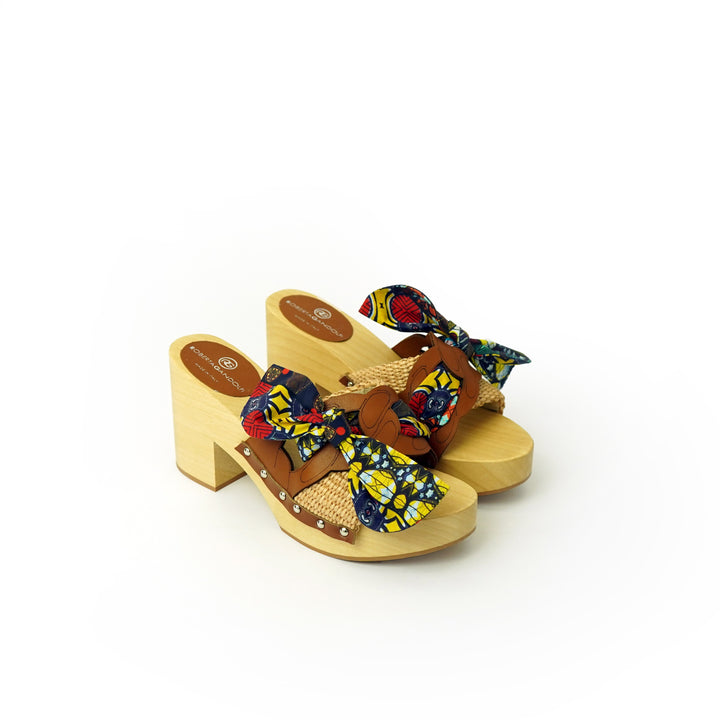 Roberta Gandolfi Diva Chain sandali in legno incrociato con platform in rafia e fiocco stamap african