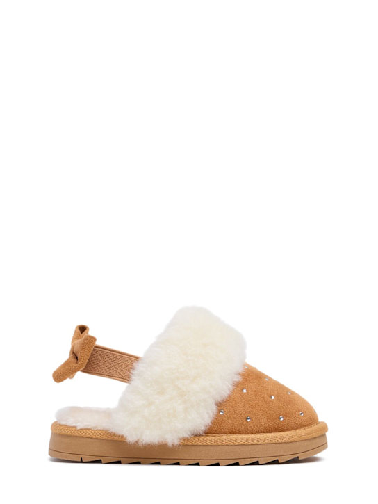 Luisaviaroma Mules in camoscio decorato con fiocchi
