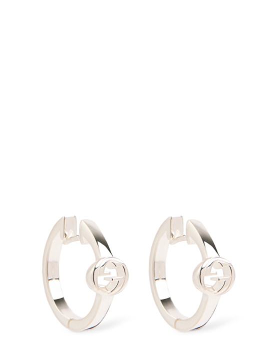 Luisaviaroma Orecchini a cerchio in argento con Interlocking GG