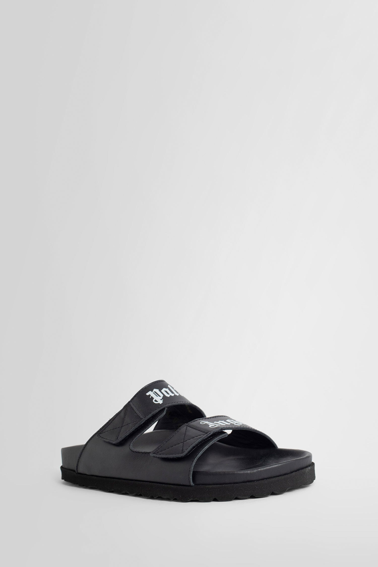 Antonioli PALM ANGELS WOMAN BLACK SANDALS & SLIDES