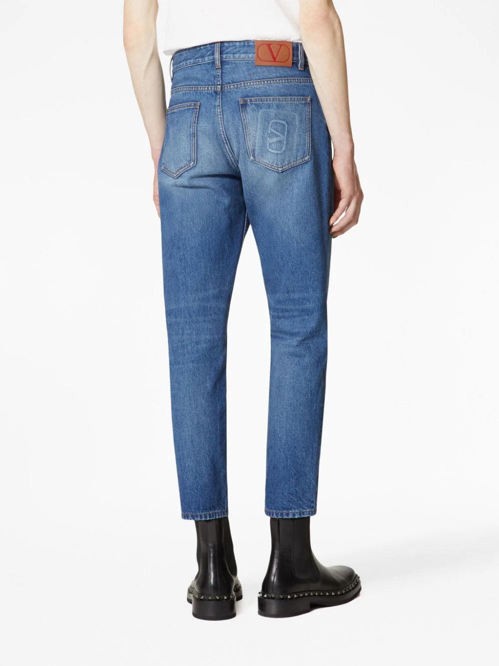 Valentino Garavani Denim Trousers With Embossed Vlogo Signature