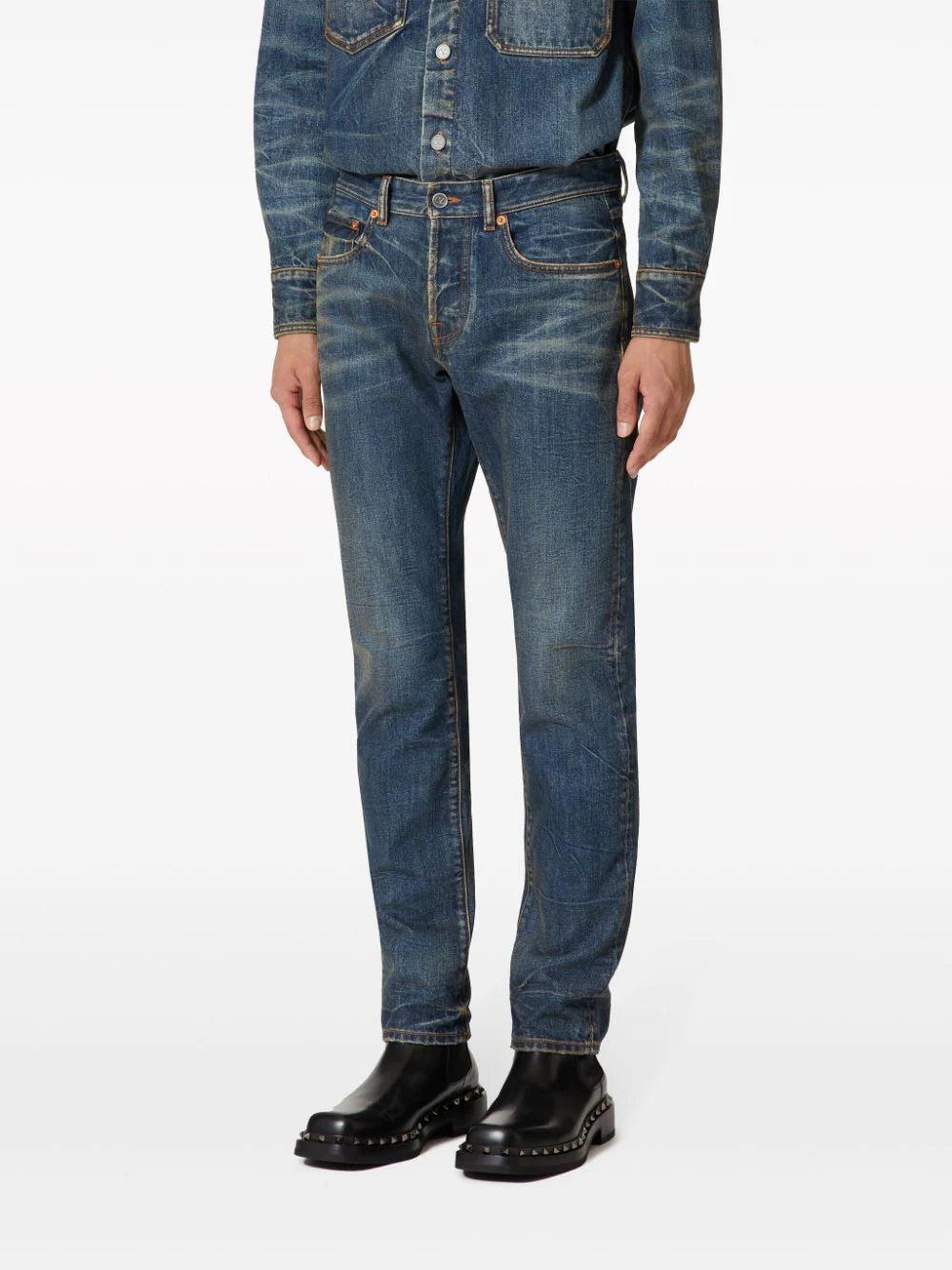 Valentino Garavani Denim Trousers With Metallic V Detail