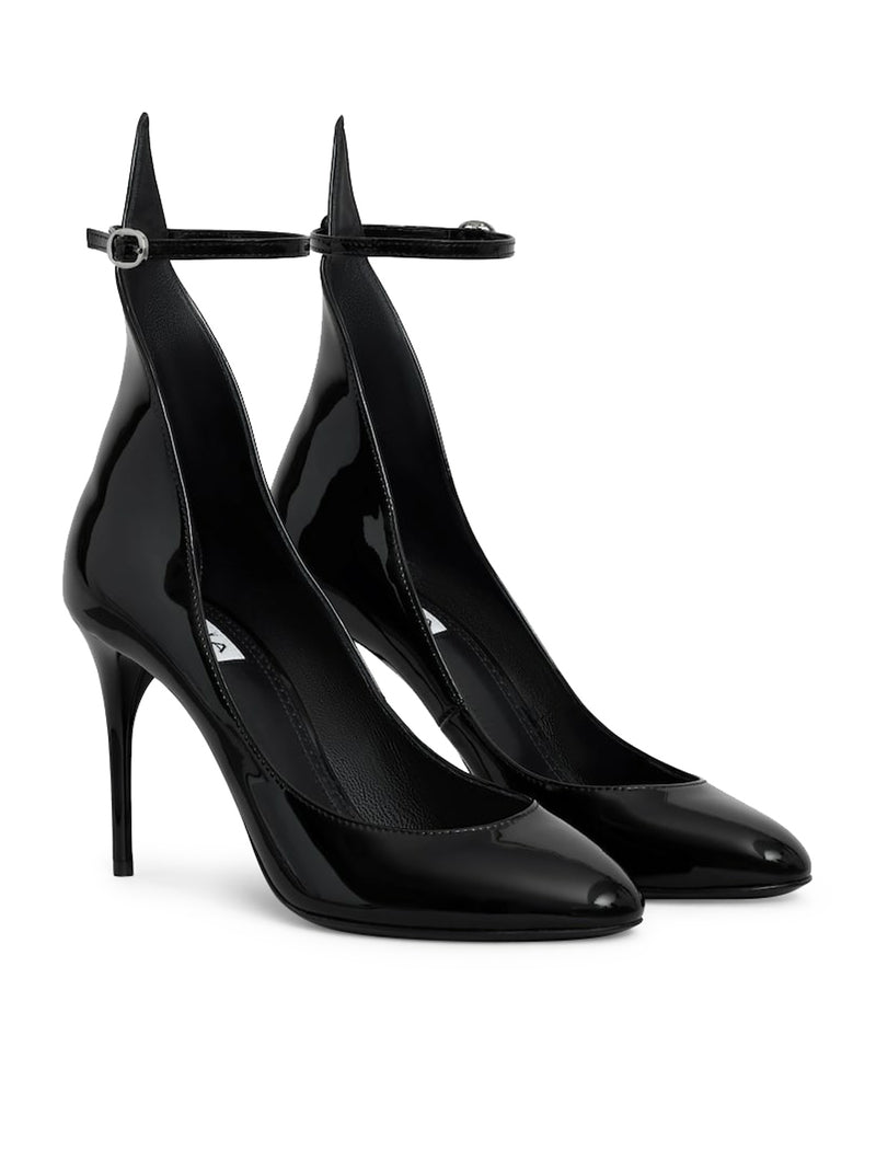 Suitnegozi DÉCOLLETÉ IN PELLE VERNICIATA