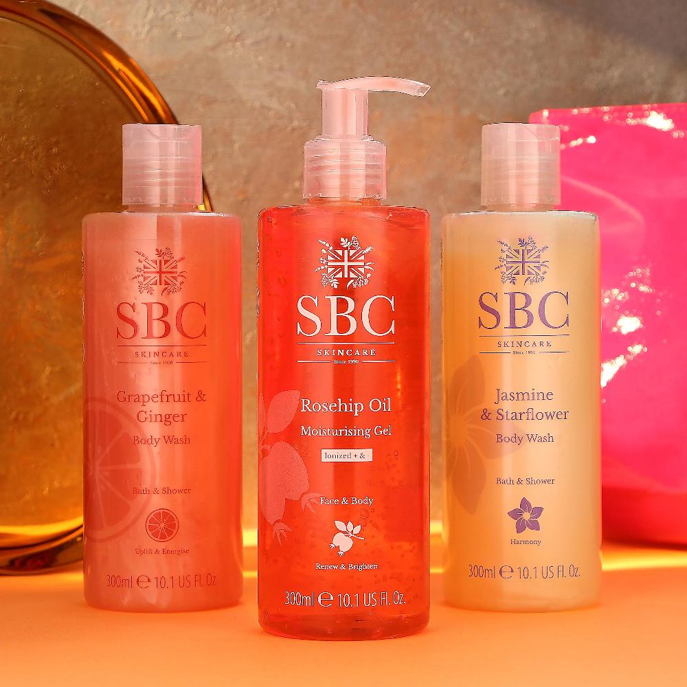 QVC SBC 2 bagnoschiuma + gel Rosa Canina + borsetta rosa