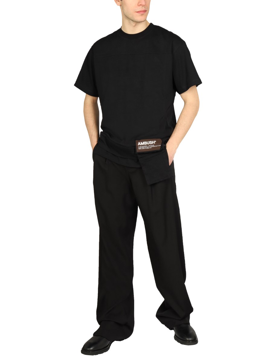 AMBUSH T-SHIRT IN COTONE CON TASCHINO
