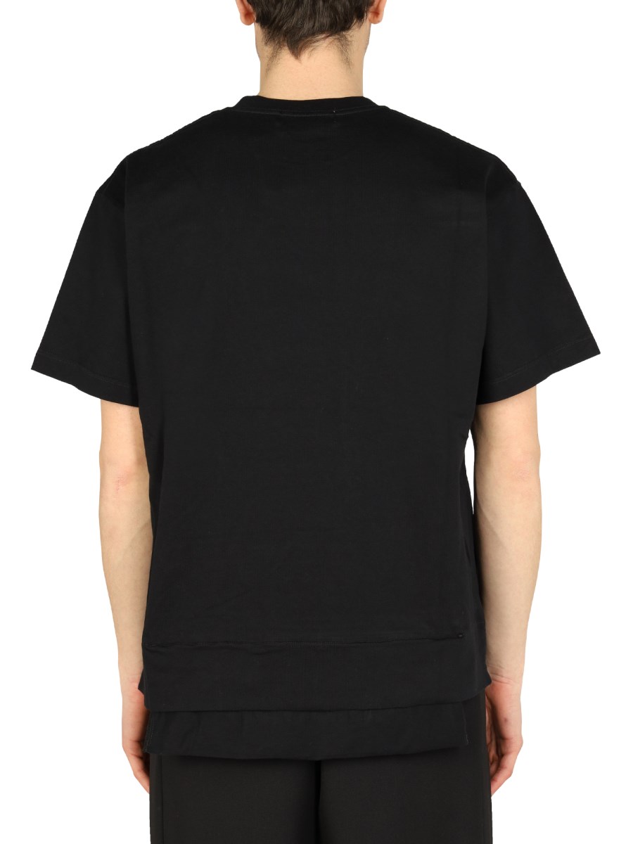 AMBUSH T-SHIRT IN COTONE CON TASCHINO