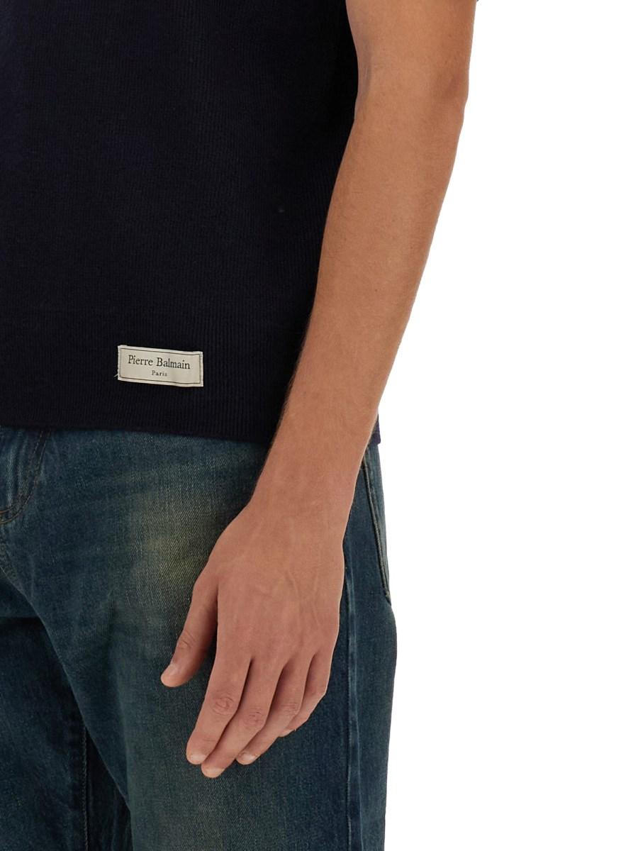 BALMAIN POLO A COSTINE IN LANA MERINO