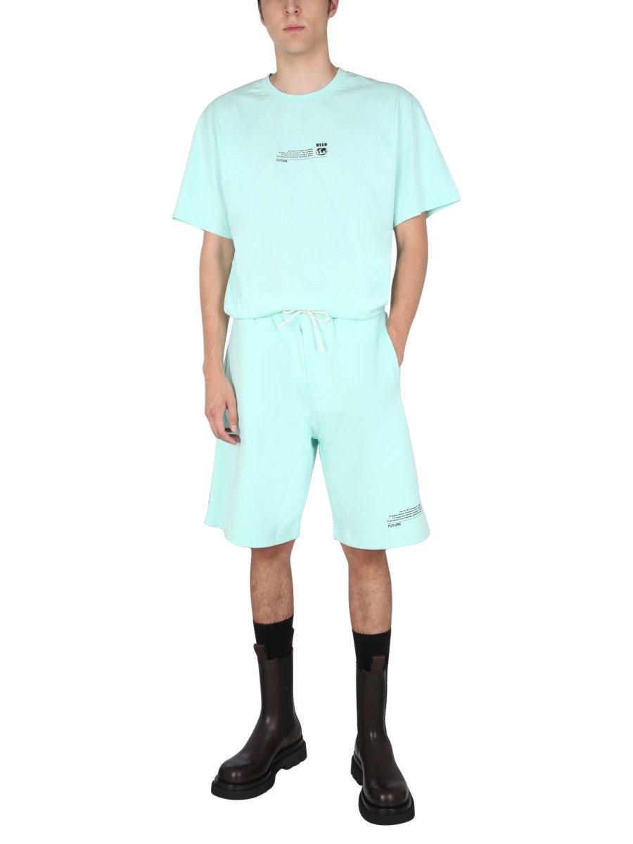 MSGM BERMUDA FANTASTIC GREEN IN COTONE CON PATCH LOGATA
