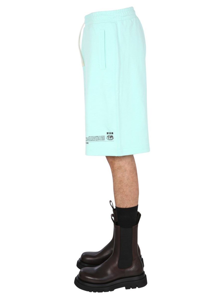MSGM BERMUDA FANTASTIC GREEN IN COTONE CON PATCH LOGATA