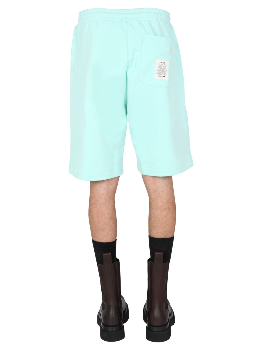 MSGM BERMUDA FANTASTIC GREEN IN COTONE CON PATCH LOGATA