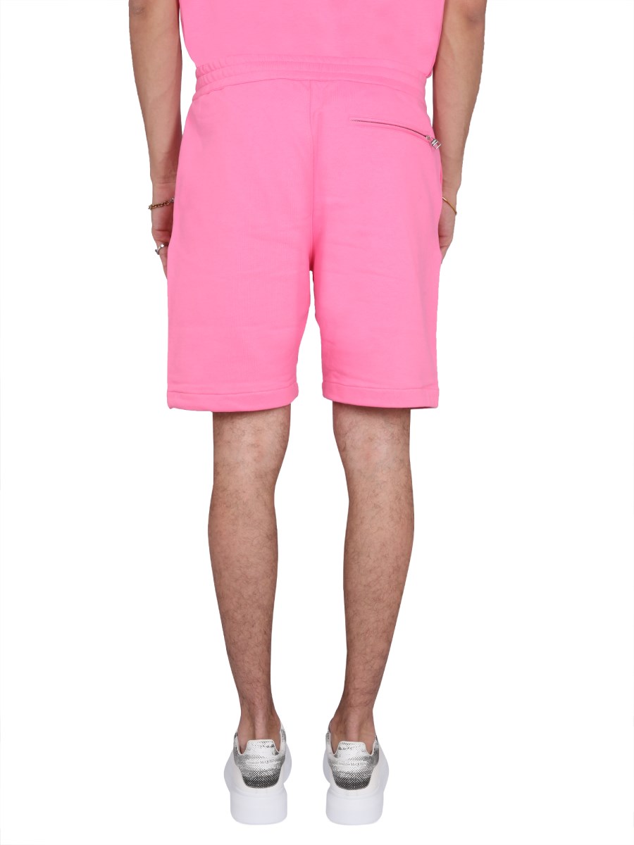 ALEXANDER McQUEEN BERMUDA IN COTONE CON STAMPA LOGO GRAFFITI