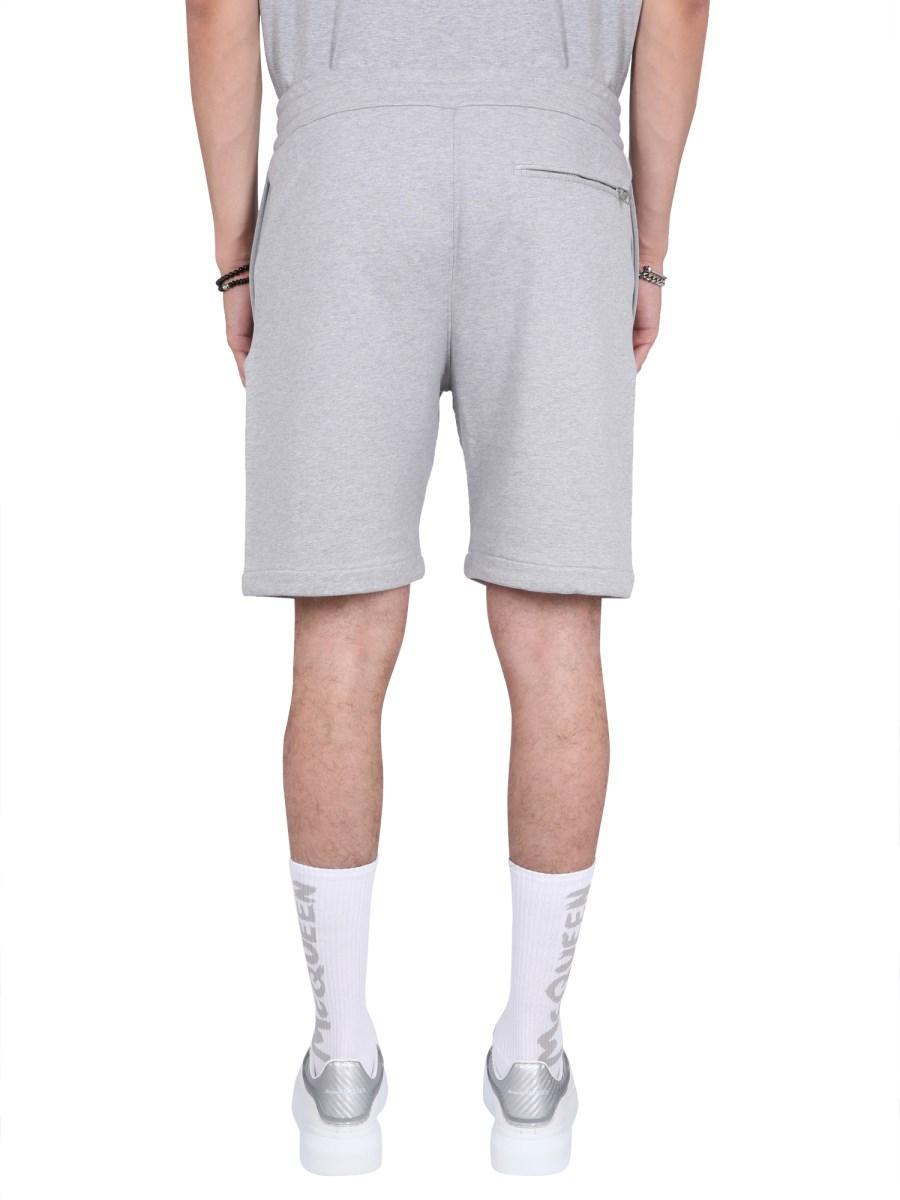 ALEXANDER McQUEEN BERMUDA IN COTONE CON STAMPA LOGO GRAFFITI