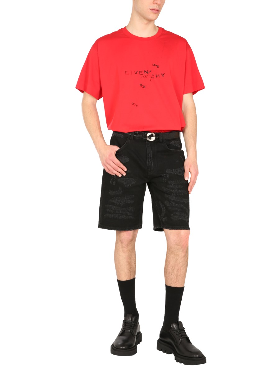 GIVENCHY BERMUDA IN DENIM DI COTONE EFFETTO DESTROYED