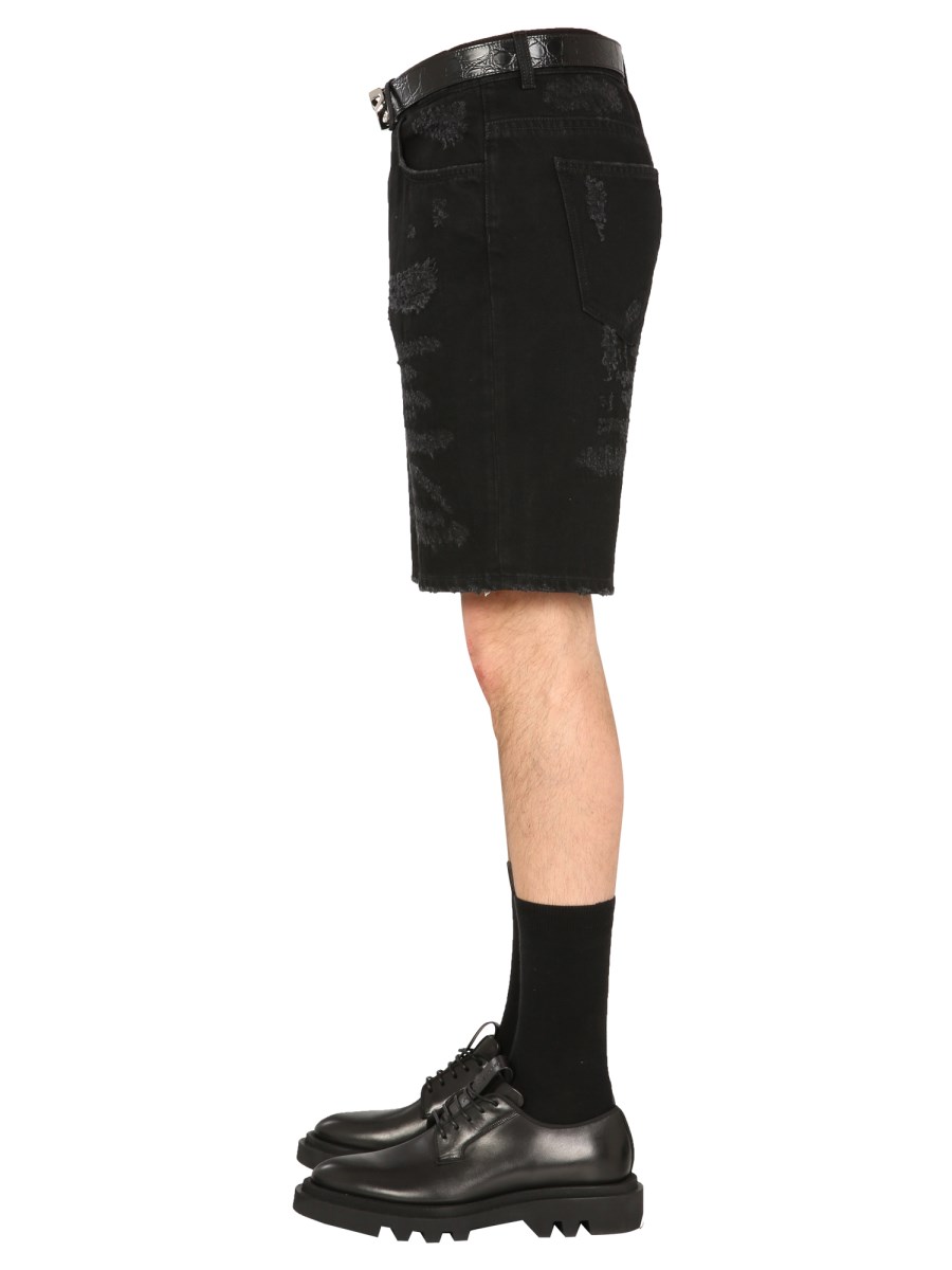 GIVENCHY BERMUDA IN DENIM DI COTONE EFFETTO DESTROYED