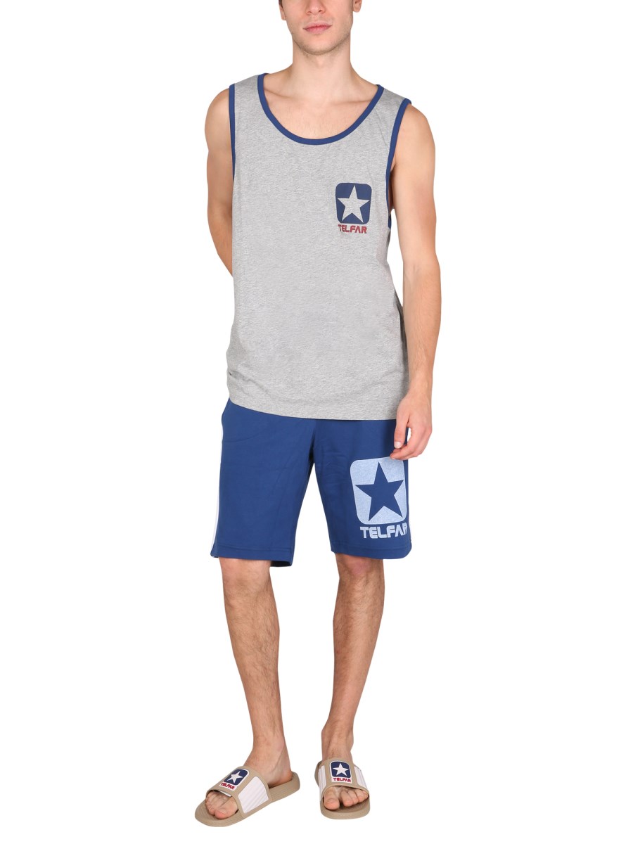 TELFAR X CONVERSE BERMUDA IN FELPA DI COTONE CON STAMPA LOGO