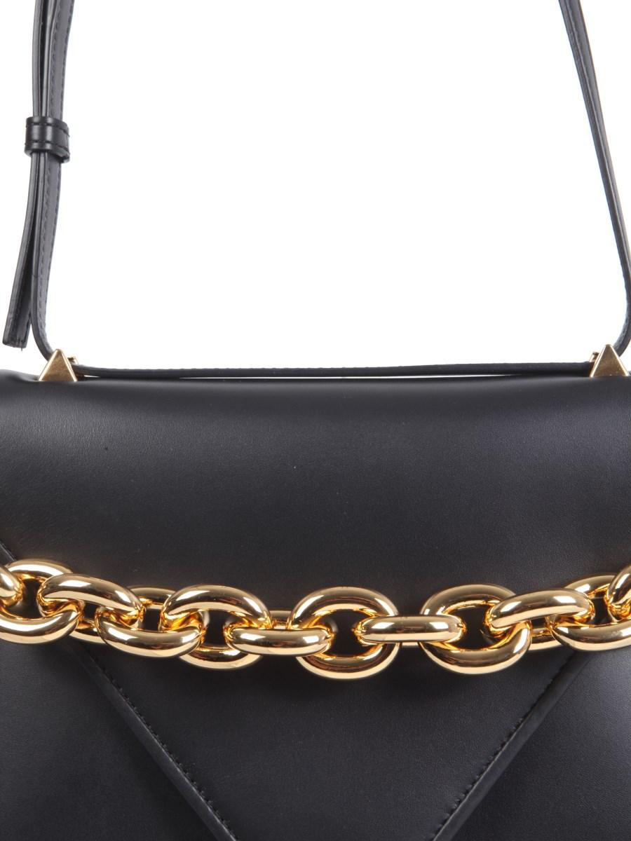 BOTTEGA VENETA BORSA A BUSTA IN SUEDE CON CATENA EXTRALARGE