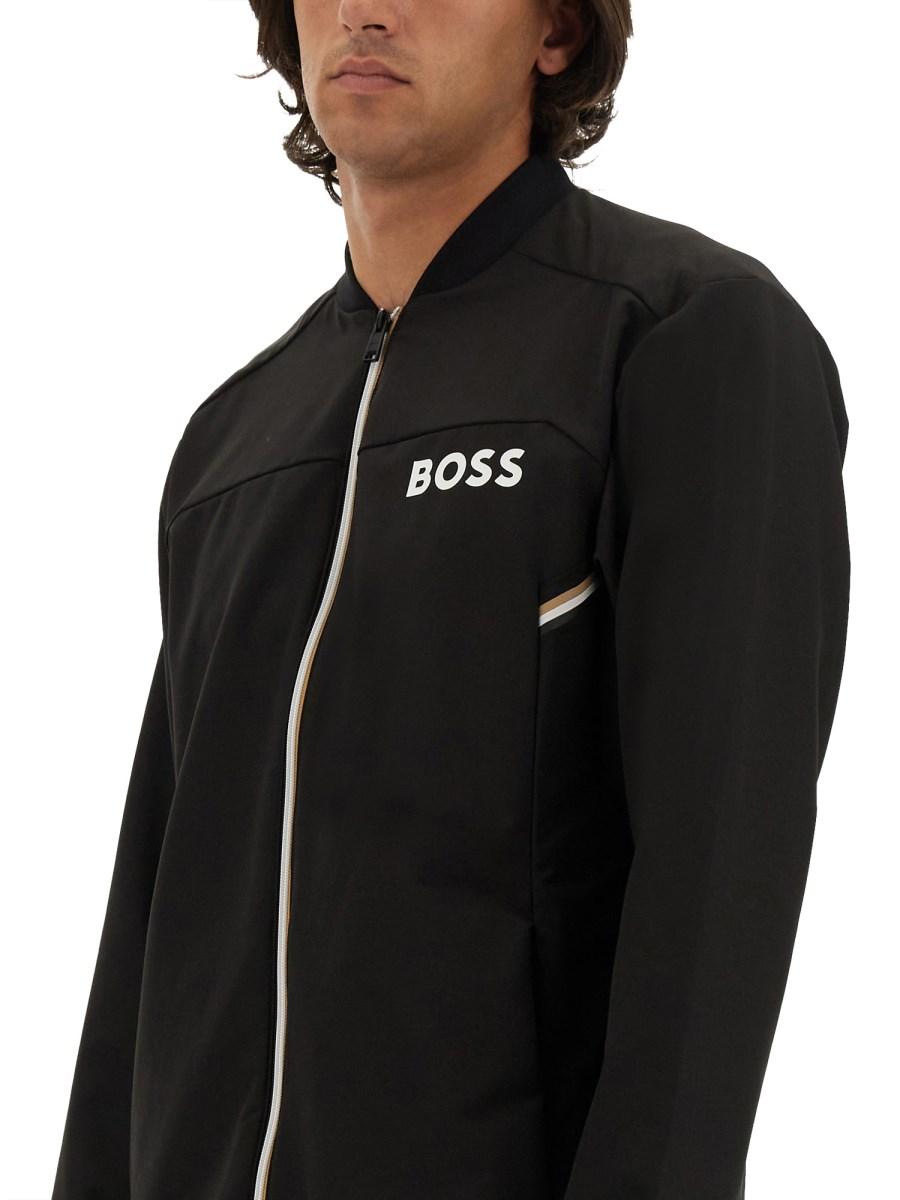 BOSS TUTA INTERA IN TESSUTO TECNICO CON LOGO