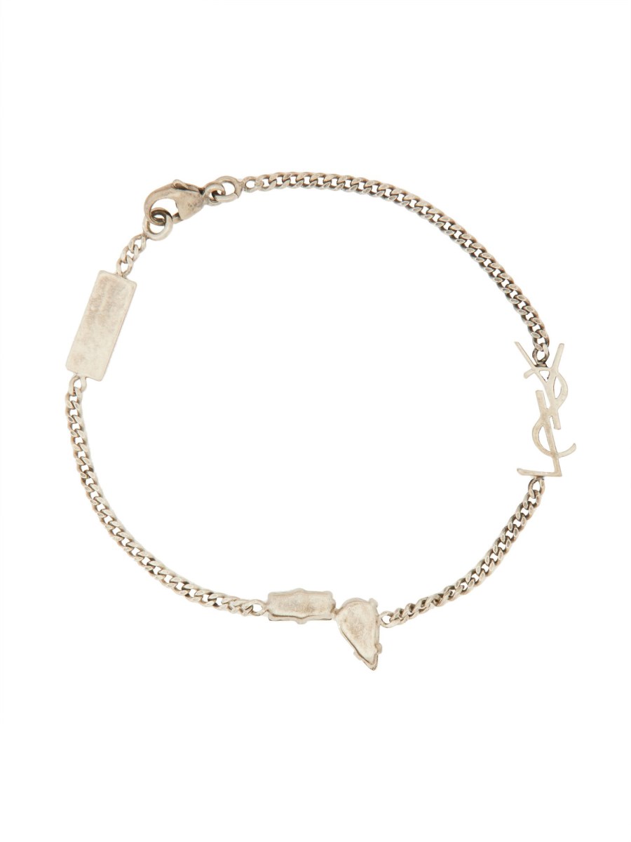 SAINT LAURENT BRACCIALE CON CHARM CASSANDRE IN METALLO E STRASS