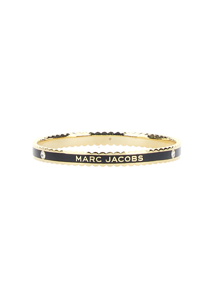 MARC JACOBS BRACCIALE THE MEDALLION IN OTTONE CON LOGO