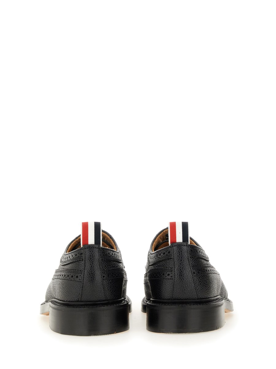 THOM BROWNE BROGUE CLASSIC LONGWING IN PELLE PEBBLE GRAIN