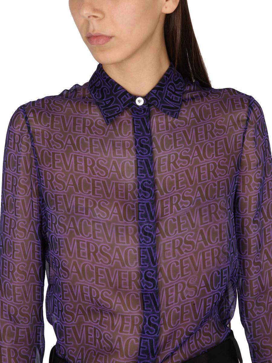 VERSACE CAMICIA IN SETA TRASPARENTE CON LOGO ALL OVER