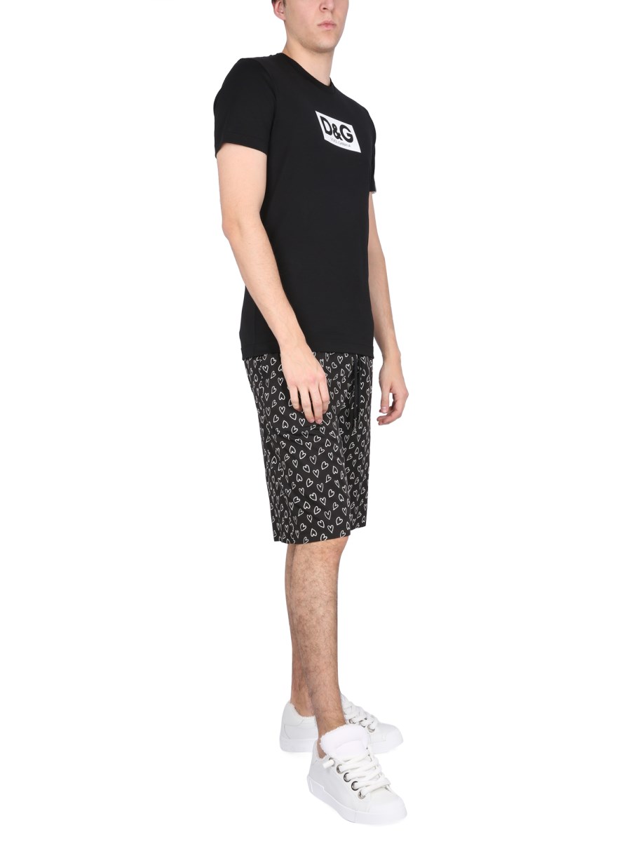 DOLCE & GABBANA BERMUDA CON STAMPA CUORI IN COTONE
