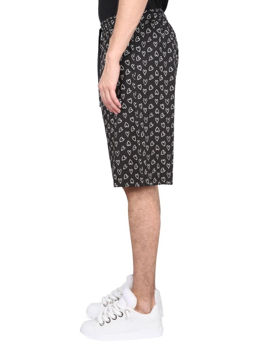 DOLCE & GABBANA BERMUDA CON STAMPA CUORI IN COTONE