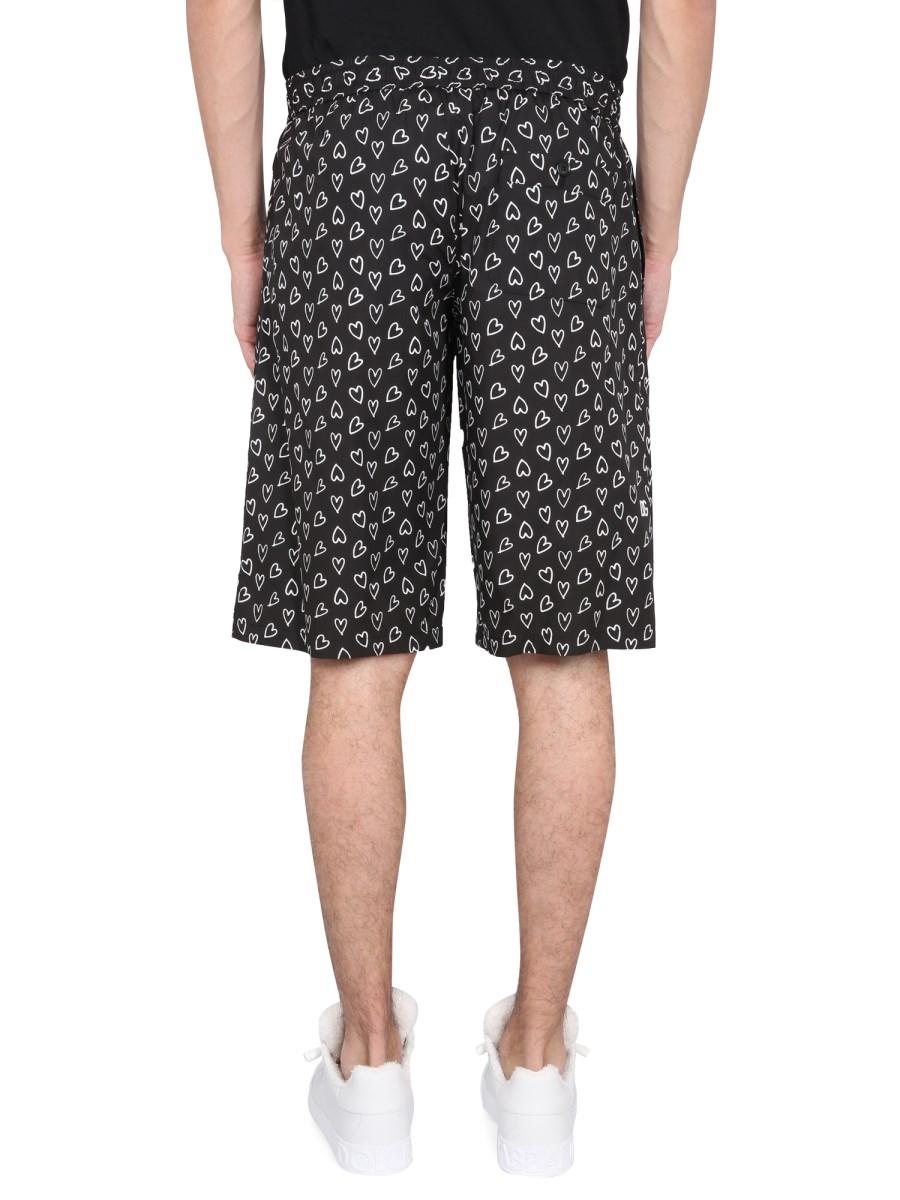 DOLCE & GABBANA BERMUDA CON STAMPA CUORI IN COTONE