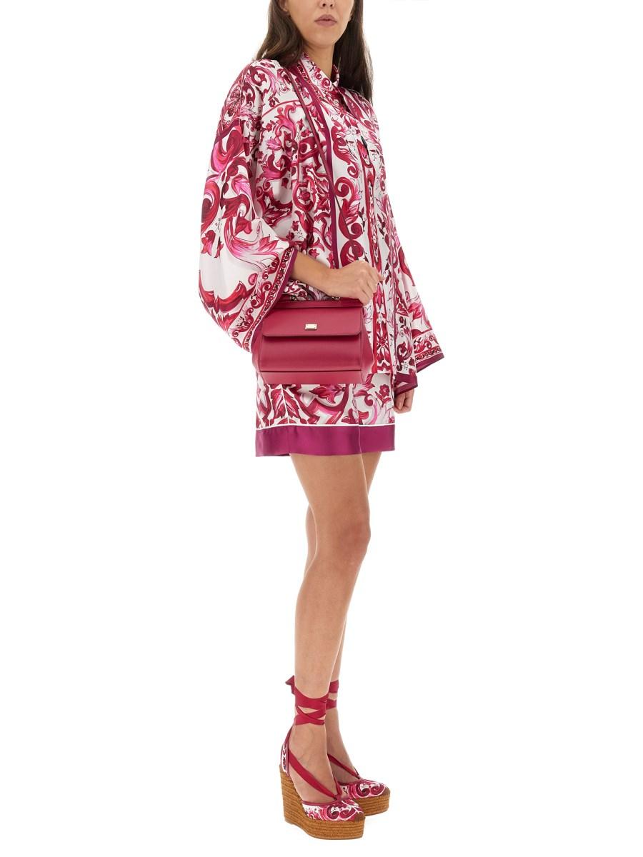 DOLCE & GABBANA SHORTS IN SETA CON STAMPA MAIOLICA
