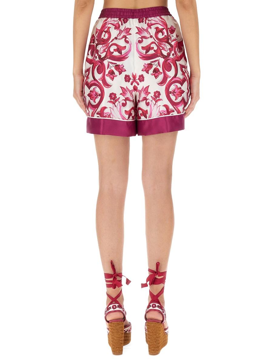 DOLCE & GABBANA SHORTS IN SETA CON STAMPA MAIOLICA