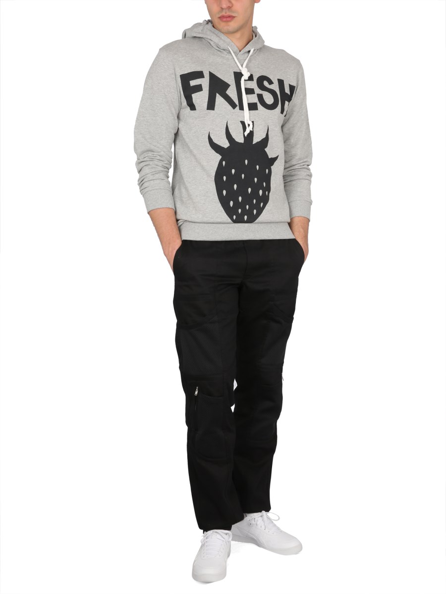 COMME DES GARCONS SHIRT FELPA CON CAPPUCCIO BRETT WESTFALL