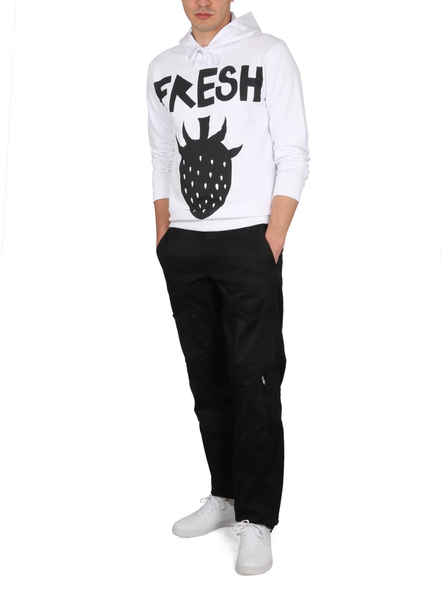 COMME DES GARCONS SHIRT FELPA CON CAPPUCCIO BRETT WESTFALL