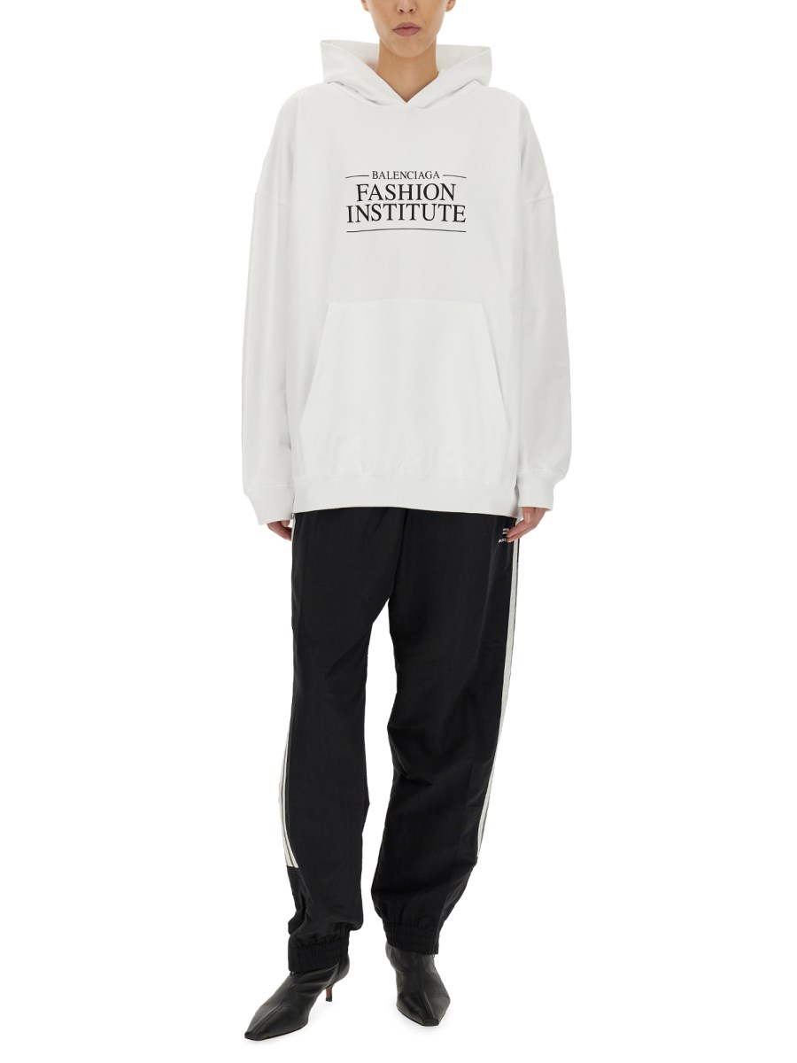BALENCIAGA FELPA FASHION INSTITUTE LARGE FIT IN COTONE
