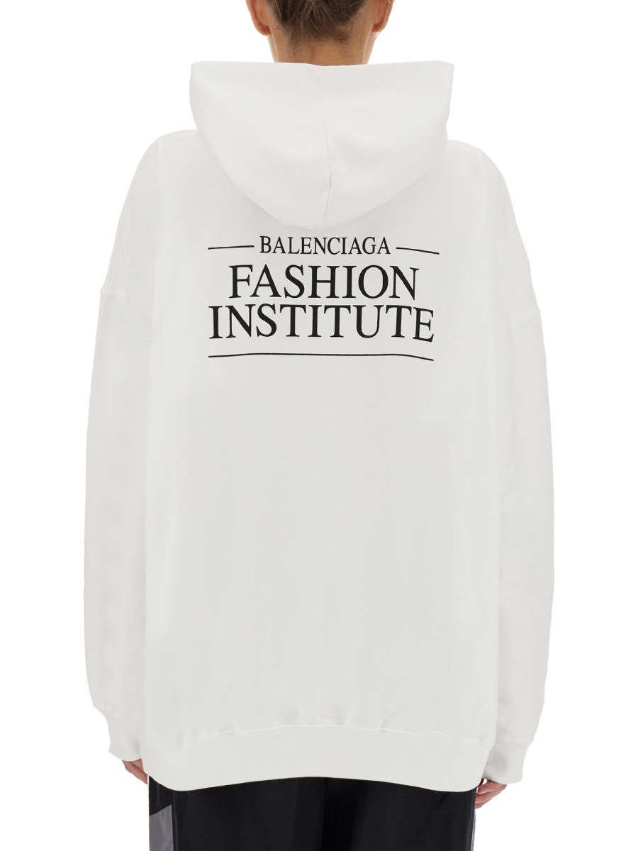 BALENCIAGA FELPA FASHION INSTITUTE LARGE FIT IN COTONE