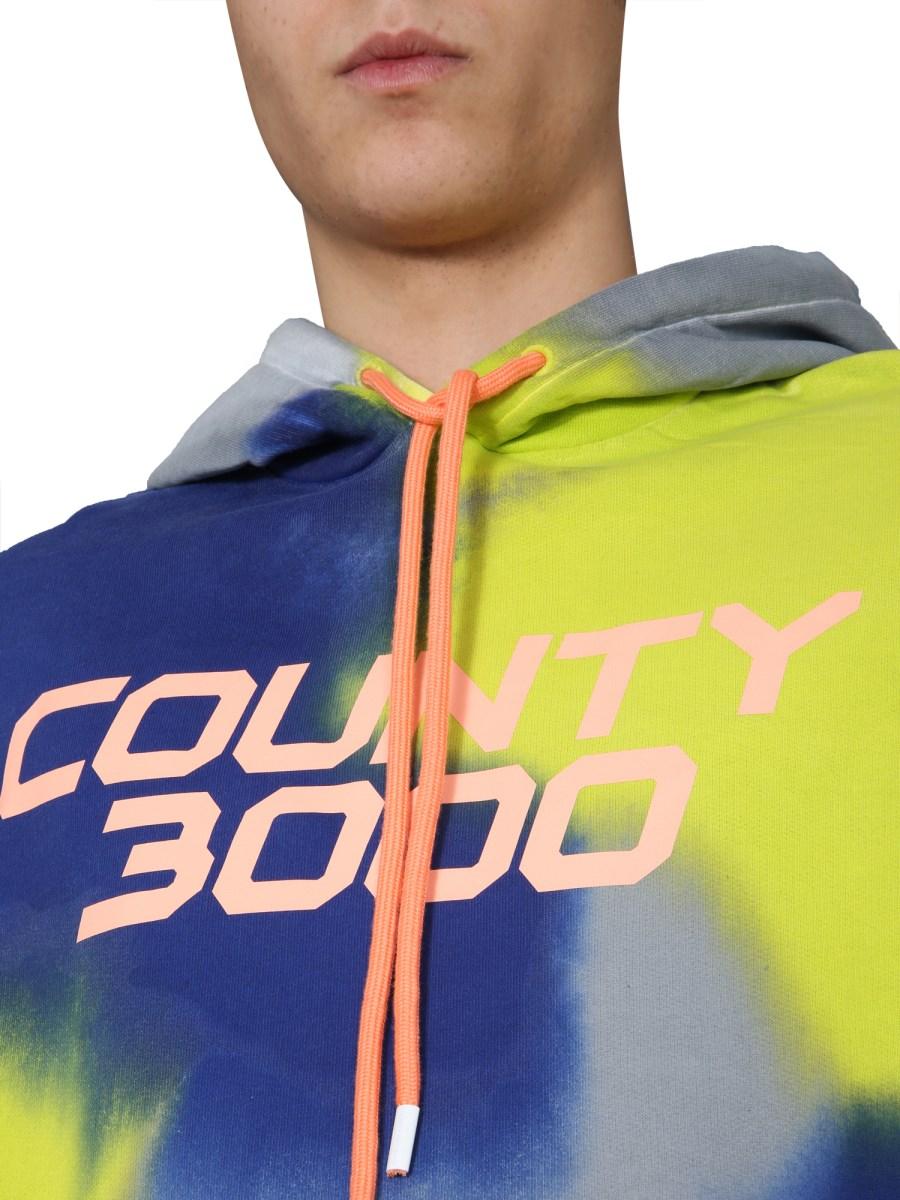 MARCELO BURLON COUNTY OF MILAN FELPA IN COTONE CON CAPPUCCIO E STAMPA TIE DYE