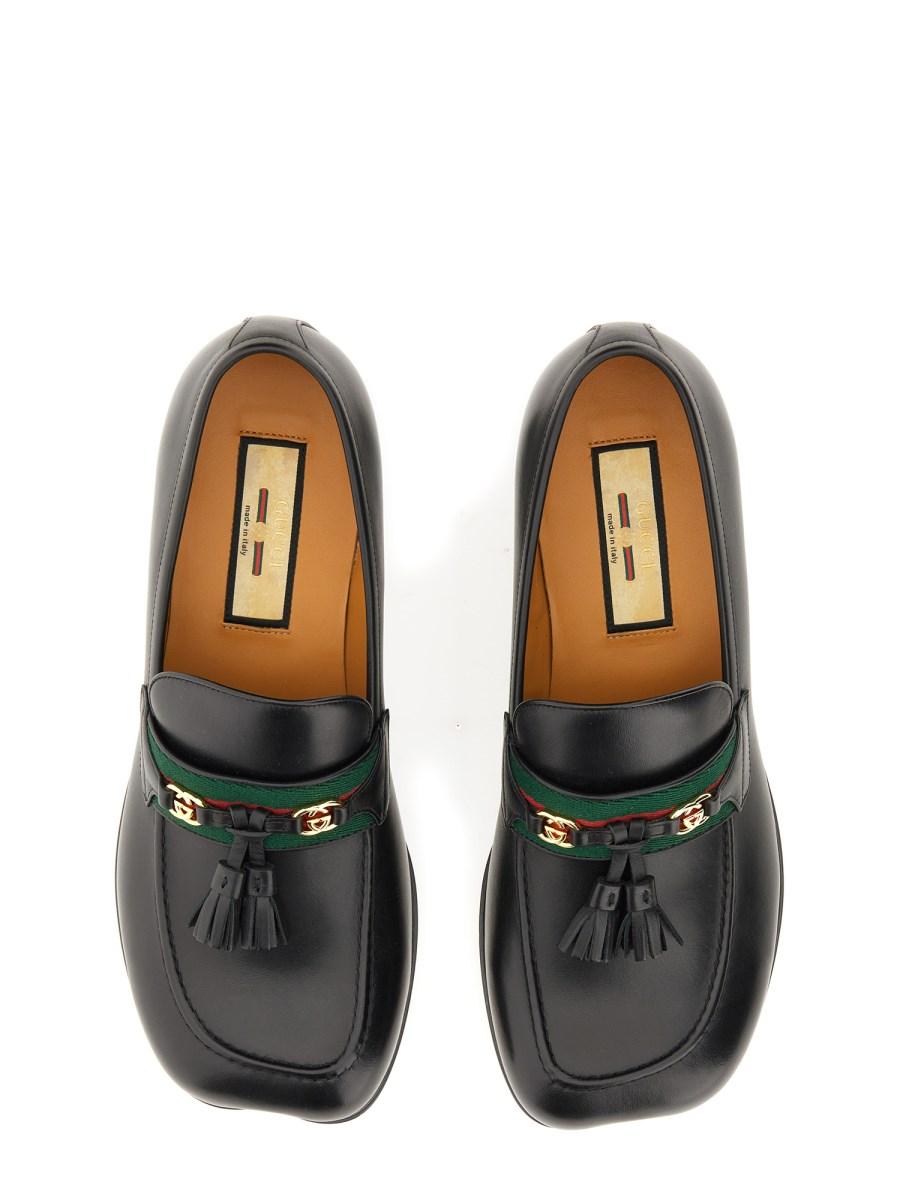 GUCCI MOCASSINO UOMO IN PELLE CON NAPPINE
