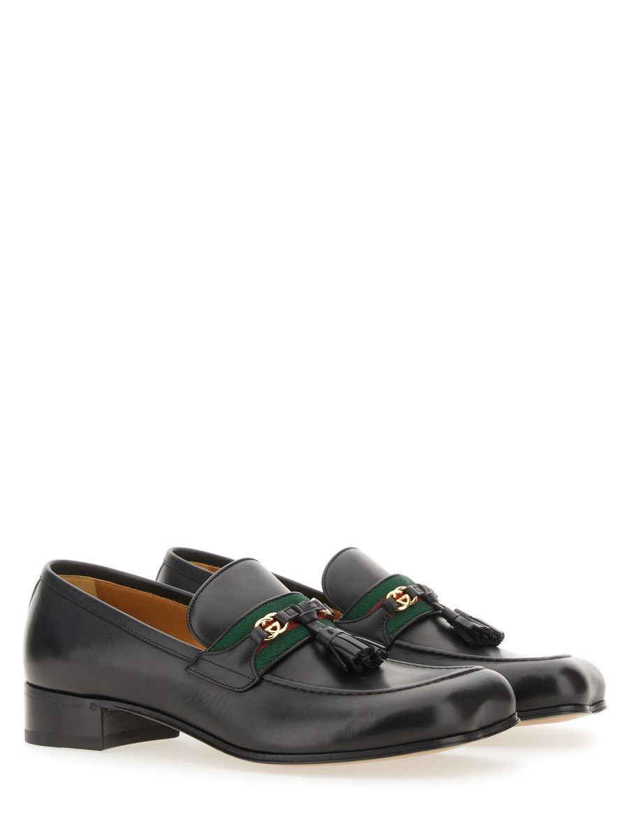 GUCCI MOCASSINO UOMO IN PELLE CON NAPPINE