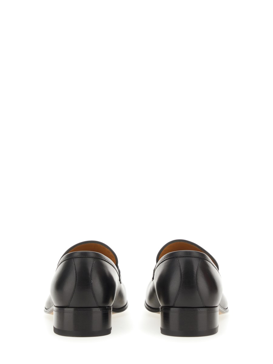 GUCCI MOCASSINO UOMO IN PELLE CON NAPPINE