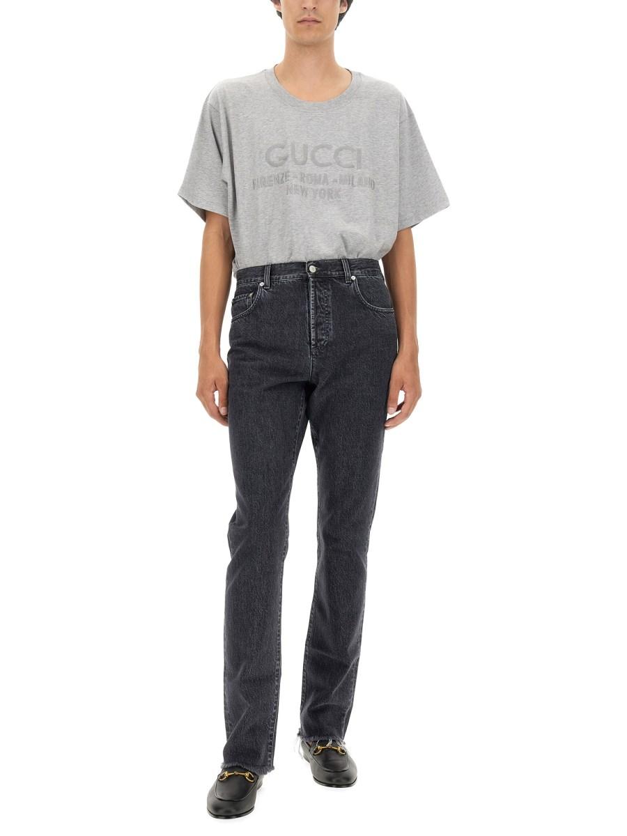 GUCCI PANTALONE IN DENIM CON ETICHETTA