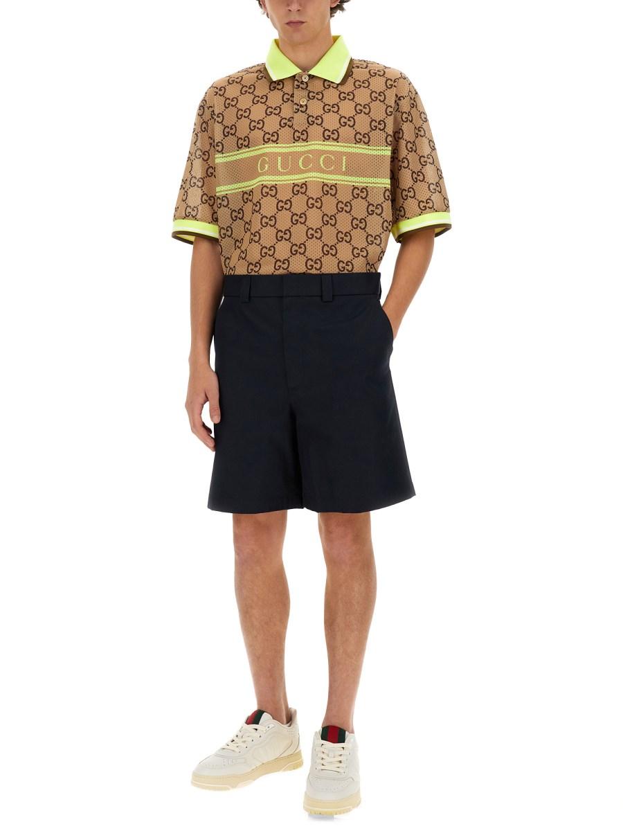 GUCCI POLO CON STAMPA GG IN RETE DI POLIESTERE
