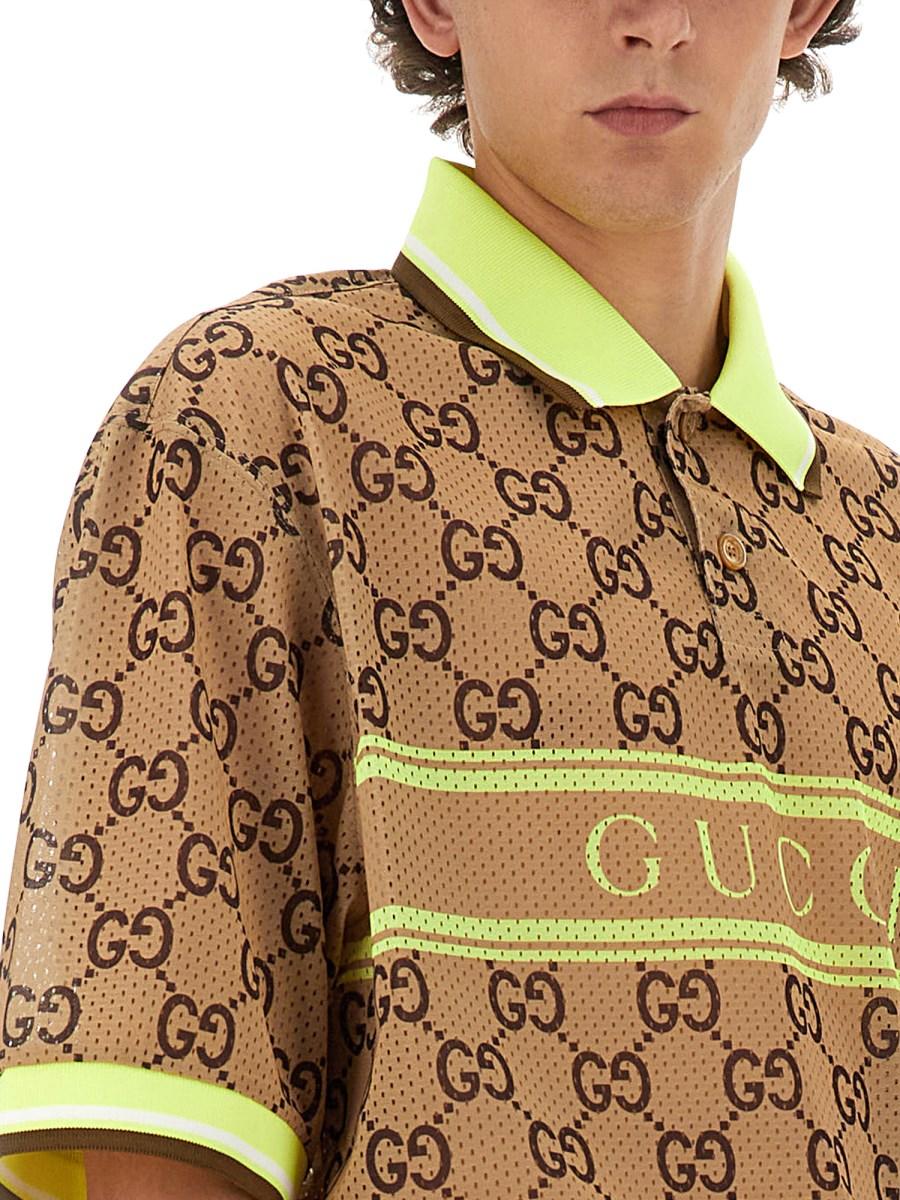 GUCCI POLO CON STAMPA GG IN RETE DI POLIESTERE