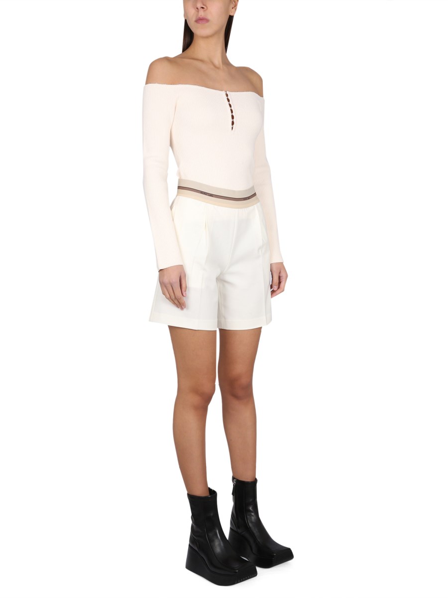 HELMUT LANG SHORT CON BANDA LOGATA