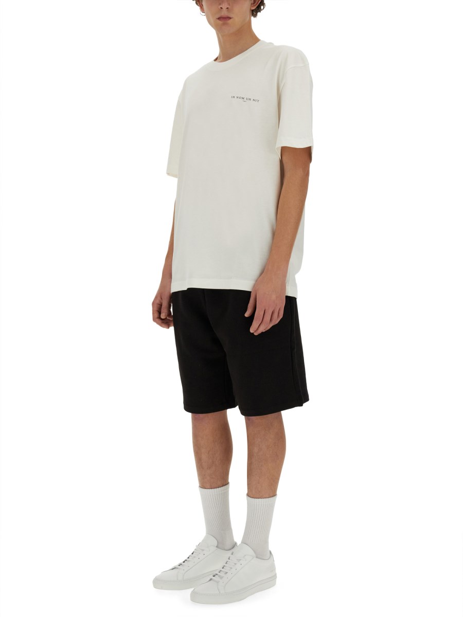 IH NOM UH NIT T-SHIRT "NEWSPAPER MASK"